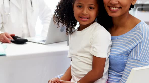 Portrait of smiling doctor and patient