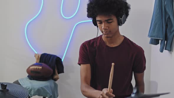 Young Man Playing E-Drums