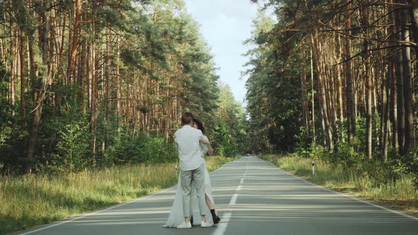 Hipster Couple in Love Walk in Beautiful Place Hold Hands Man and Woman Hugging and Enjoying