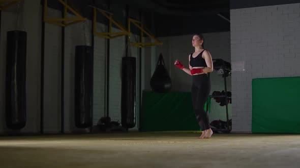 Coordination Training in Boxing Gym Caucasian Female Fighter Jumps on a Rope Strength Fit Body