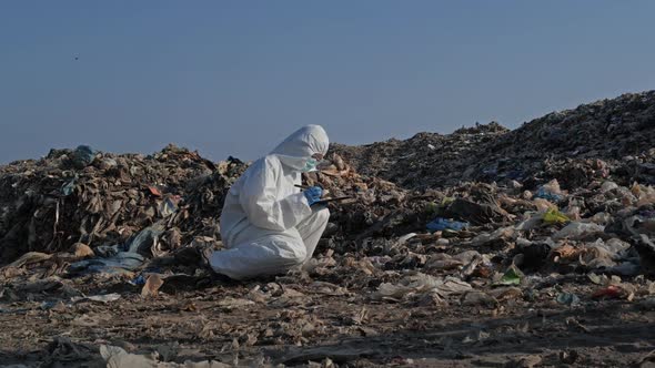 scientist checking waste will be dumped