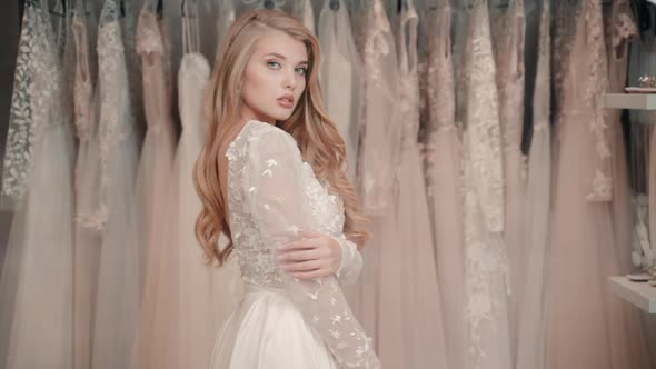 Bride Wearing Wedding Dress Posing in Studio Room