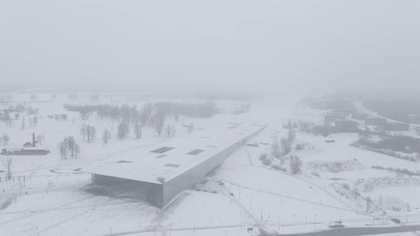 Drone shot of Estonian national museum during snowing ERM