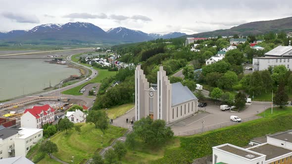 Iceland Lutheran Church of Akureyi with drone video moving in.