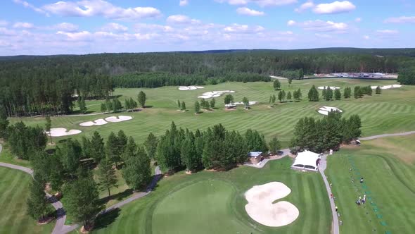 Golf Course With Green And Sand Bunker