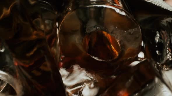 Ice Cubes In A Glass. Warm Tea. Close-up.