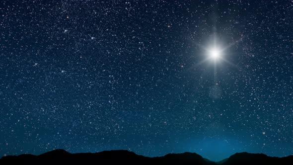 The star shines over the manger of christmas of Jesus Christ.