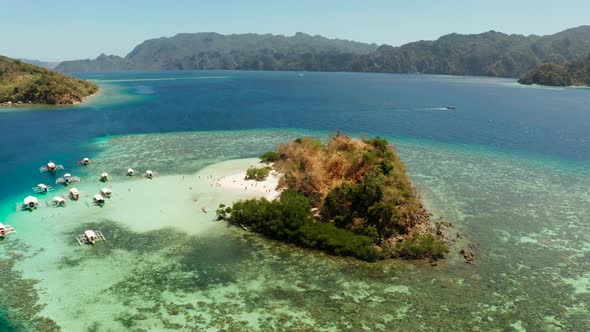 Small Torpical Island with White Sandy Beach Top View