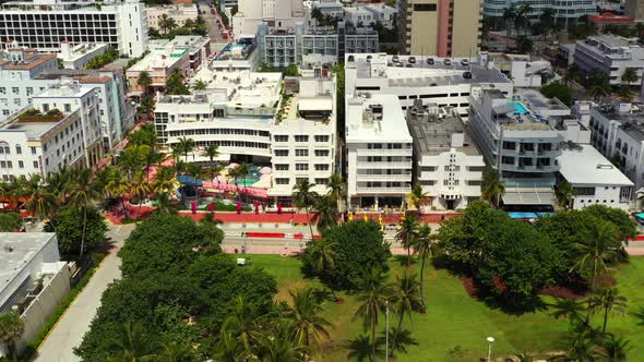 Aerial Lateral Slow Motion Video Miami Beach Ocean Drive Hotels 4k 60p