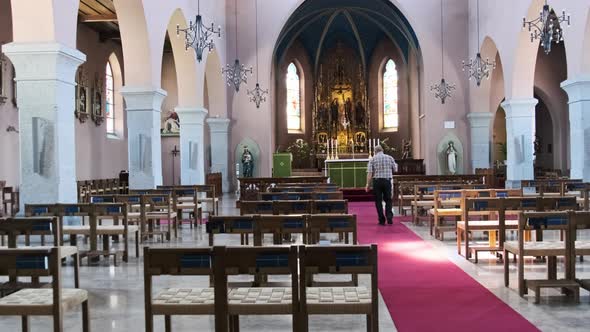 Empty Catholic Cathedral Inside Wooden Benches for Prayers Church Interior