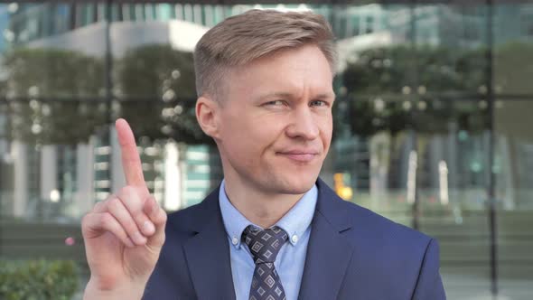 No Businessman Rejecting Offer By Waving Finger