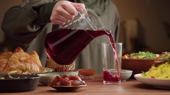 Pouring Juice Muslim Family Dinner Ramadan Iftar