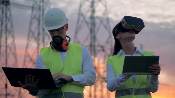 Workers Using Virtual Reality Glasses at Construction Site. 3d VR Engineering Concept.