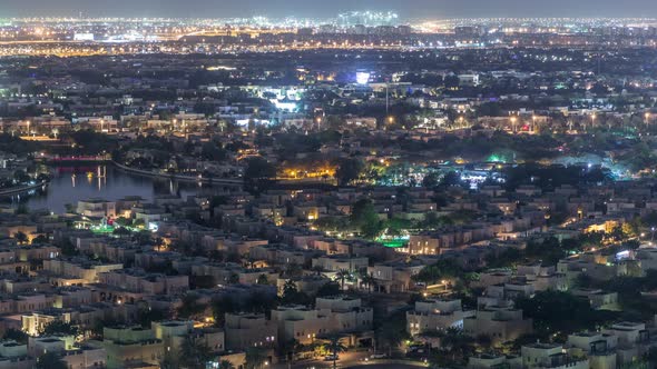 Aerial View to Villas and Houses with Golf Course Night Timelapse