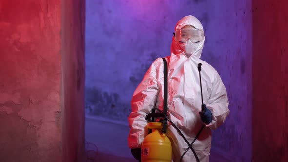 Portrait of doctor epidemiologist, virologist fighting with coronavirus COVID-19 in protective suit