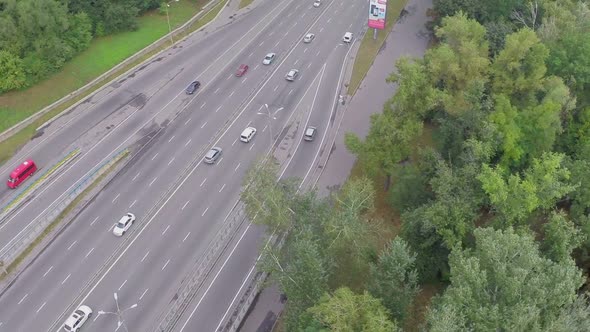 Car Traffic Driving Fast on Busy City Freeway, Aerial View