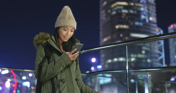 Asian Woman use of smart phone in Hong Kong