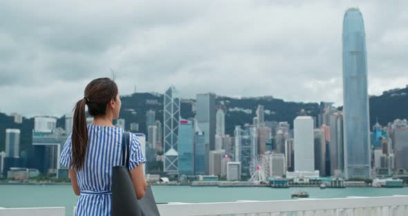 Woman look at view in Hong Kong