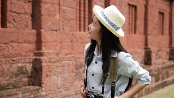 Woman visiting ancient temple