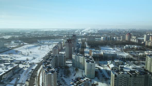 City quarters. Multi-story houses. Winter cityscape.