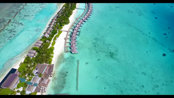 Aerial travel of paradise lagoon beach time by blue green lagoon with white sand background of a day