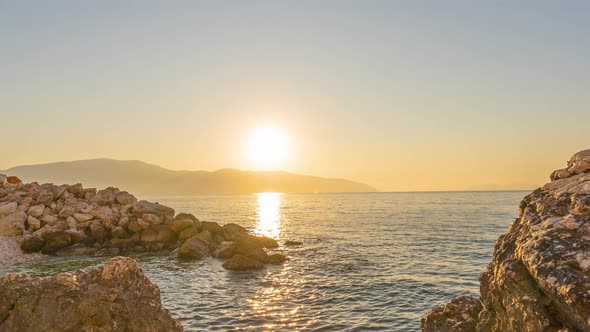 Timelapse  the Sun Comes Over the Horizon on the Background of the Sea