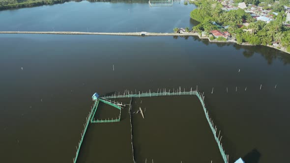 Aerial view of a small marine fish farm in a salt water lagoon