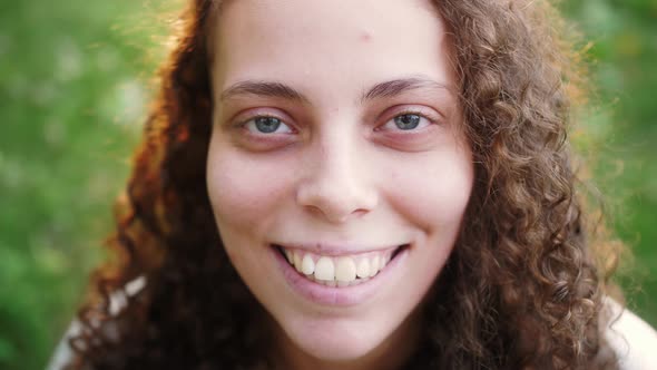 Close Up Portrait of a Happy Carefree Mixed Race Teenage Girl