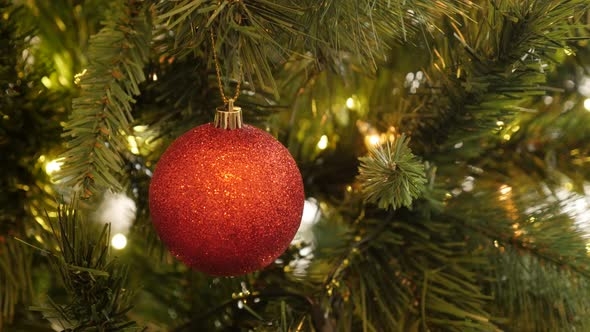 Close-up of red Christmas ornament with sequins  4K 2160p 30fps UltraHD footage - Decorative bauble 