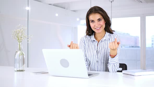 Hispanic Woman in Office Inviting Customers with Both Hands