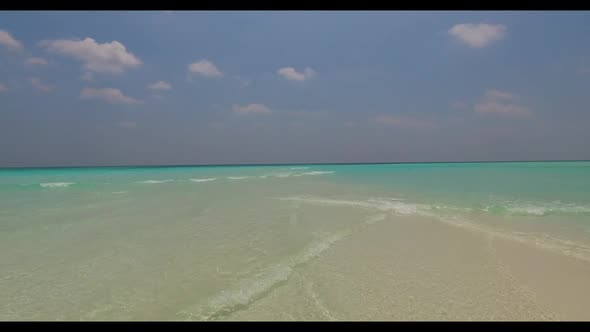 Aerial drone panorama of tropical lagoon beach time by blue ocean and white sand background of a day