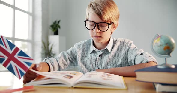 Boy Reading English Book