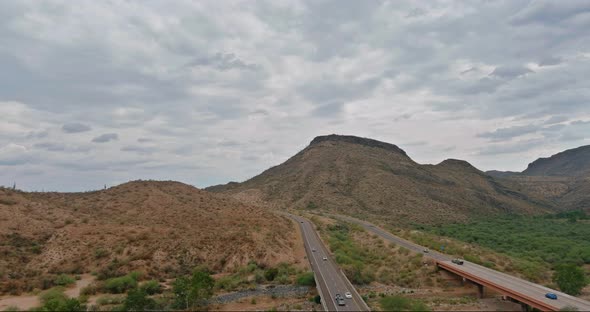 Aerial View Highway Across the Arid Desert Arizona Mountains Adventure Traveling Desert Road