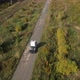 Truck Driver Without Cargo is Driving on Road Through a Picturesque Forest Area - VideoHive Item for Sale
