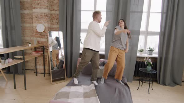 Couple Dancing in Loft Apartment