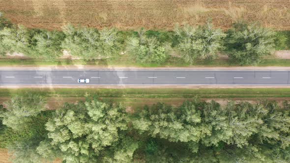 Asphalt Road Highway Through Agricultural Field With Driving Cars Aerial View