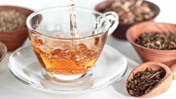 Super Slow Motion Shot of Pouring Tea on White Background at 1000 Fps