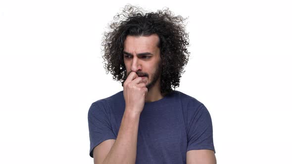 Portrait of Nervous Man with Beard and Mustaches Touching His Mouth and Expressing Problem or Stress