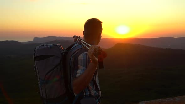 Young Man Traveler Looking at Beautiful Nature Scenery While Hiking in Countryside Spbd