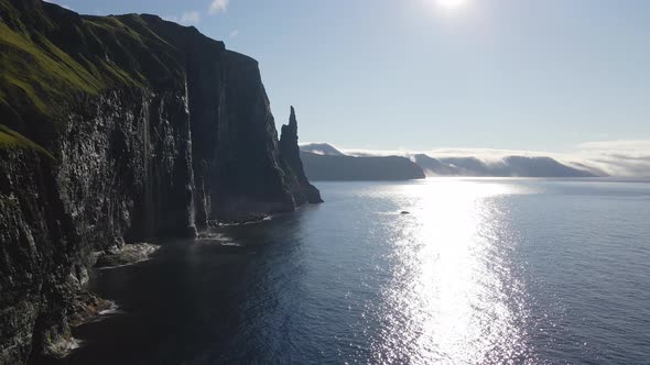 Drone Along Coastline Of Vagar With Trollkonufingur