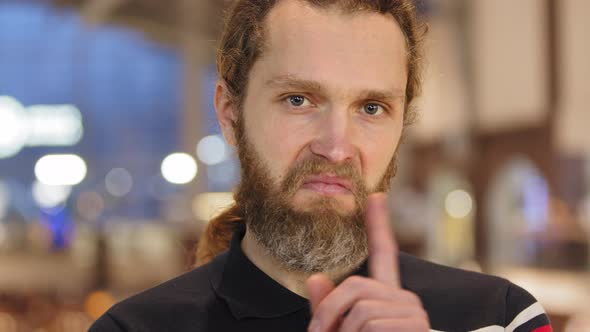 Portrait of Caucasian Bearded Man Angry Guy Waving Head and Finger in Disagreement Negative Denies