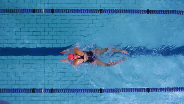 Swimmer training in a swimming pool