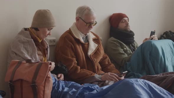 Refugees Resting in Shelter Indoors