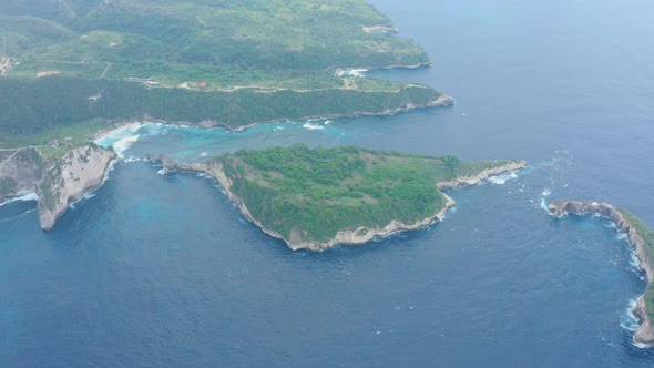 Aerial View of Tropical Island Washed By Ocean Atuh Beach