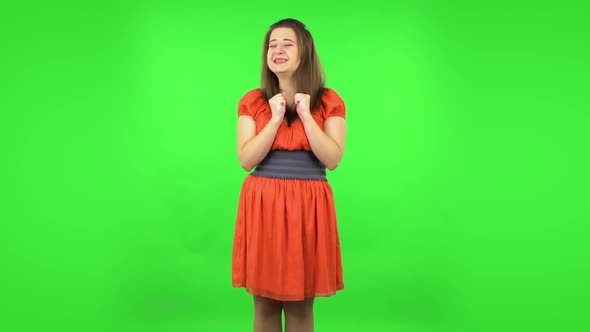 Cute Girl Very Rejoicing, Clapping and Dancing. Green Screen