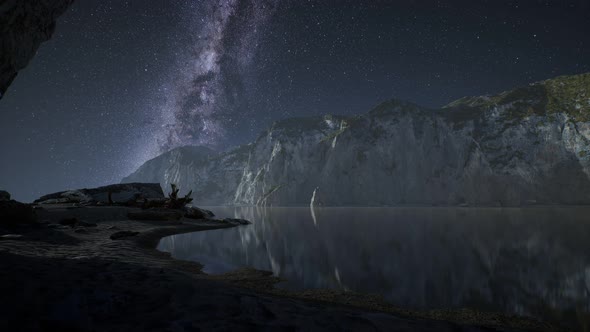 Hyperlapse of Night Starry Sky with Mountain and Ocean Beach in Lofoten Norway