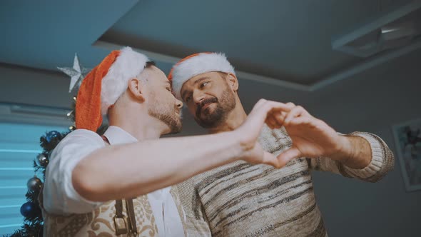 Happy Gay Couple Celebrating Christmas