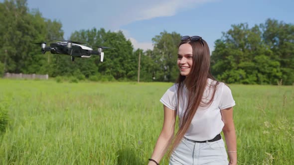 A Beautiful Girl Launches a Drone in Her Palm