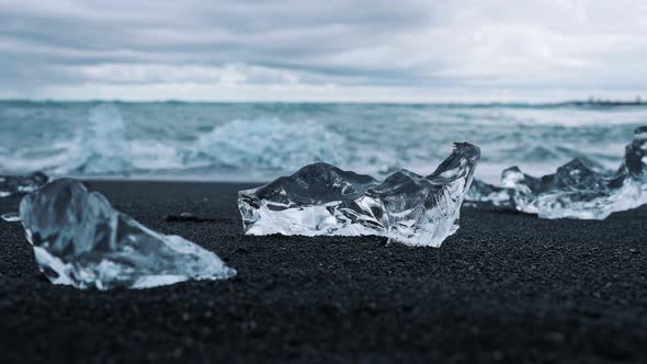Closeup of Beautiful Iceberg on Black Sand at Diamond Beach in Iceland