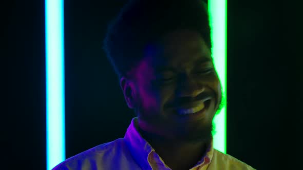 Portrait Young Stylish African American Male Smiling Enjoying Music